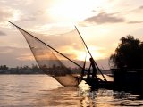 Rybář na řece Mekong ve městě Can Tho